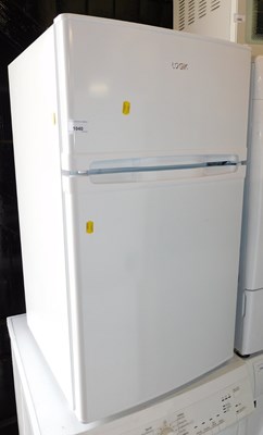 Lot 1040 - A Logik undercounter fridge freezer.