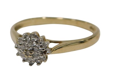 Lot 148 - A diamond flower cluster ring, of three...