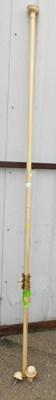 Lot 1118 - A limed curtain pole, approx 220cm long, with...