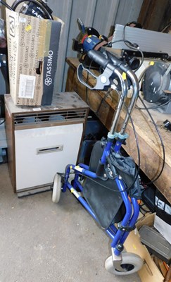 Lot 1125 - An oil burning heater, together with a bicycle...