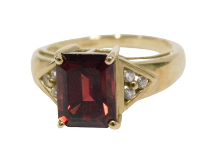 Lot 155 - A 9ct gold dress ring, the central rectangular...