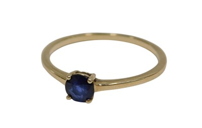 Lot 158 - A sapphire solitaire ring, the round brilliant...