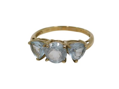 Lot 160 - A 9ct gold three stone dress ring, set with...