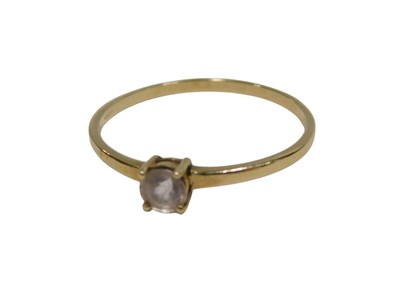 Lot 264 - A TGGC solitaire diamond dress ring, the round...