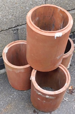 Lot 1165 - Four terracotta chimney pots, lacking bases,...