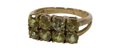 Lot 140 - A 9ct gold panel dress ring, set with eight...