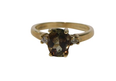 Lot 141 - A 9ct gold smokey quartz and diamond set dress...