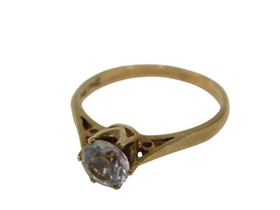 Lot 145 - A solitaire dress ring, set with an imitation...