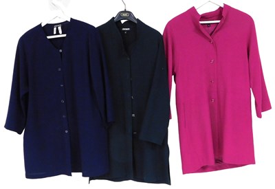 Lot 605 - A Jean Muir raspberry polyester button front...
