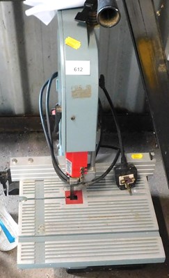 Lot 612 - A Delta electric band saw.
