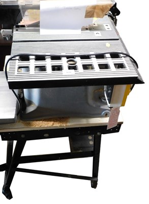 Lot 620 - A woodworker 10" table saw, on a stand.
