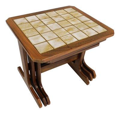 Lot 627 - A 1970s G-Plan teak nest of occasional tables,...