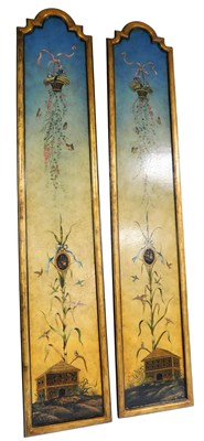 Lot 638 - A pair of giltwood framed panels, painted...