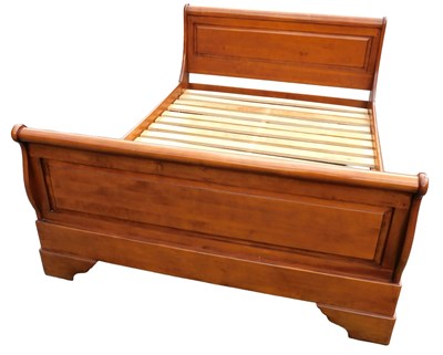Lot 639 - A Willis & Gambier double cherrywood sleigh bed.