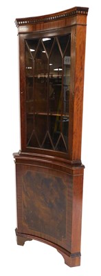 Lot 641 - A Georgian style mahogany concave corner...