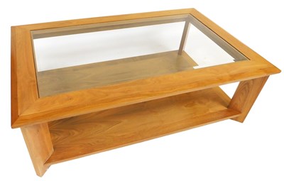 Lot 644 - A late 20thC walnut coffee table, the top...