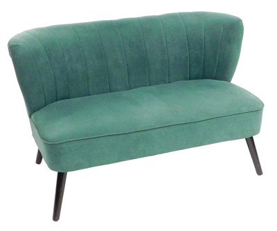 Lot 654 - A two seater sofa, upholstered in green/blue...