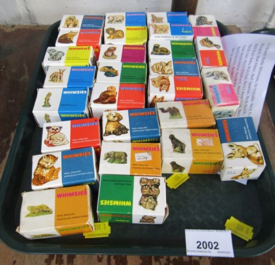 Lot 2002 - A collection of Wade Whimsies, boxed. (1 tray)