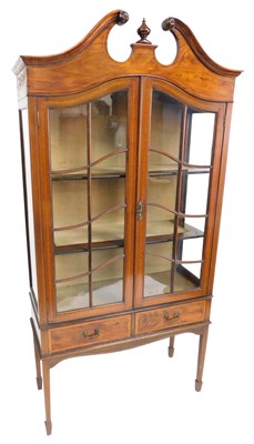 Lot 701 - An Edwardian mahogany display cabinet, with...