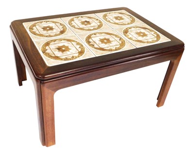 Lot 721 - A G-Plan teak tile top coffee table, set with...