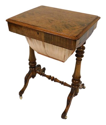 Lot 730 - A Victorian walnut drum sewing table, the...