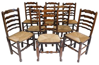 Lot 733 - A set of eight 19thC oak ladderback dining...
