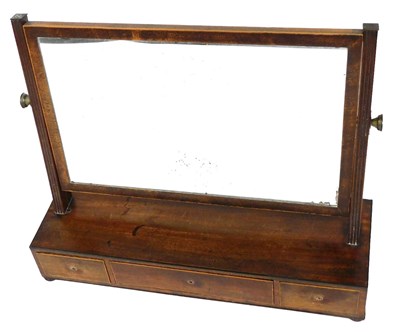 Lot 735 - A Georgian mahogany swing frame toilet mirror,...