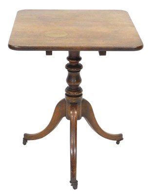 Lot 657 - A Georgian mahogany tilt top occasional...