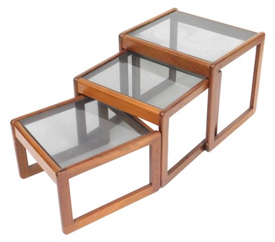 Lot 661 - A mid century Danish teak nest of occasional...