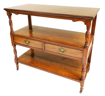 Lot 678 - A Victorian mahogany and oak buffet, the top...