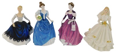 Lot 72 - Four Royal Doulton porcelain figures, modelled...
