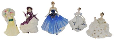 Lot 75 - Five Royal Doulton porcelain figures, modelled...