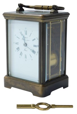 Lot 150 - A Rapport brass cased carriage clock, the...