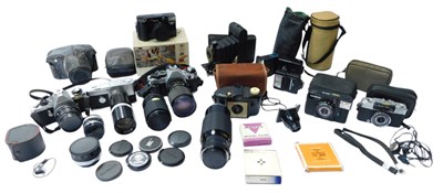 Lot 153 - A group of cameras and other optical related...