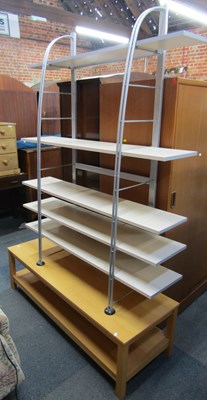 Lot 1003 - A contemporary shelving unit of five shelves,...