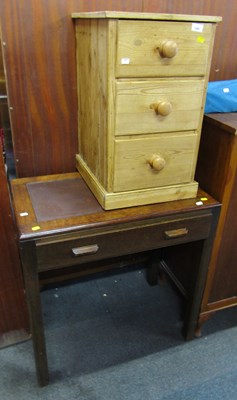Lot 1004 - A pine three-drawer bedside chest, and an oak...