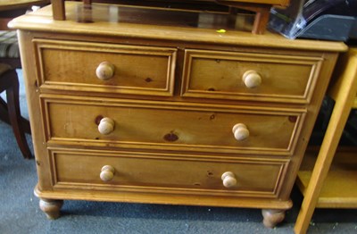 Lot 1005 - A pine chest of two short over two long...