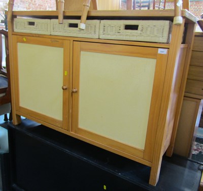 Lot 1007 - A sideboard, with three rattan drawers, above...