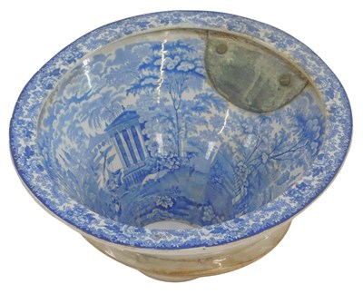 Lot 193 - A Victorian blue and white earthenware toilet...