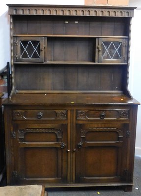 Lot 1011 - An Old Charm style dresser, with plate rack,...