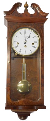 Lot 228 - A Comitti of London wall clock, circular white...