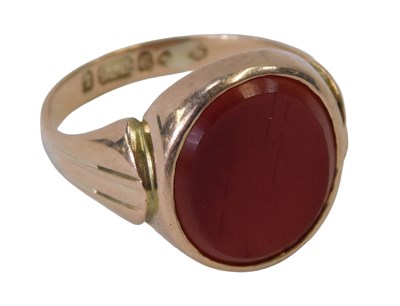 Lot 391 - A 20thC 9ct gold signet ring, set with an oval...