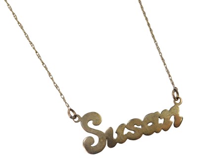 Lot 395 - A 9ct gold Susan pendant and chain, the...