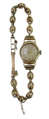 Lot 354 - A 9ct gold Record lady's wristwatch, with a...