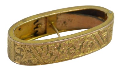 Lot 361 - A 9ct gold tie clip, with half engraved design,...