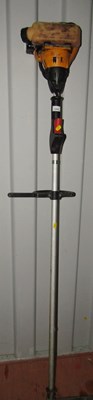 Lot 1084 - A JCB petrol strimmer and accessories.