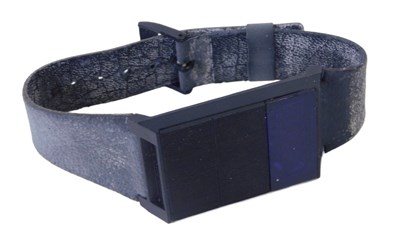 Lot 407 - A Sinclair electronic watch, on a black...