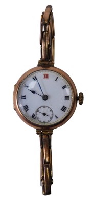 Lot 411 - A 9ct gold cased 20thC wristwatch, with white...