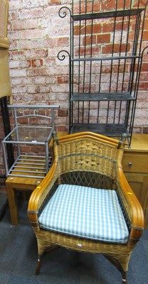 Lot 1038 - A four-tier metal plant stand, a wicker...