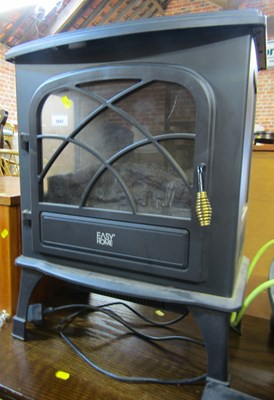 Lot 1042 - An Easi-Home log and coal-effect electric fire....